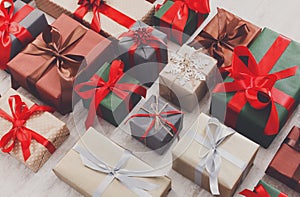 Lots of Gift boxes on wood, holiday presents in paper