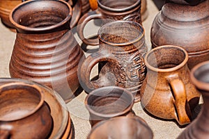 Lots of handmade clay pot, bowl and mug.
