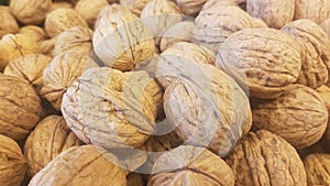 Lots of inshell walnuts texture