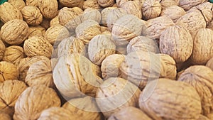 Lots of inshell walnuts texture