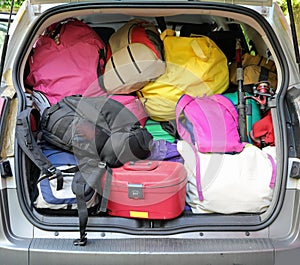 lots of luggage and suitcase during the departure of family holi