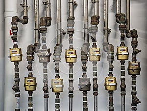 Lots of metal pipe meter background view