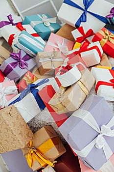 Lots of multi-colored birthday gifts Christmas background