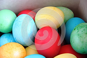 lots of multi-colored Easter eggs. Easter Painting eggs. blue, red, yellow and green eggs