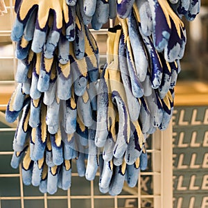 Lots of new textile rubberized work gloves in store