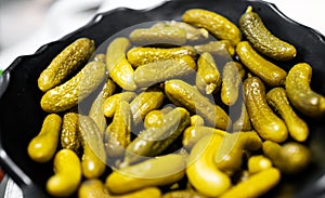 Lots of small pickled gherkins