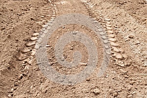 Lots tire track on dirty soil ground for abstract background