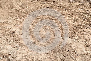 Lots tire track on dirty soil ground for abstract background