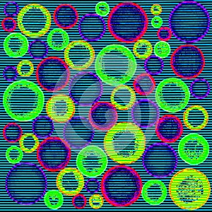 Lots of various sizes of colourful circles on lined paper.