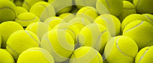 Lots of vibrant tennis balls