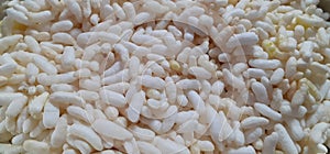 Lots of white puffed rice stacked together