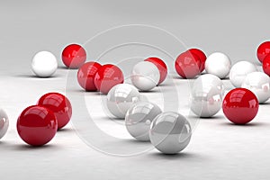 Lots of white and red balls interact photo
