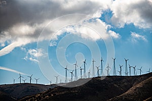 Lots of windturbines on a hill in Califronia, USA. photo