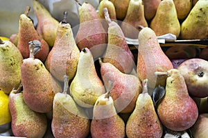 Lots of yellow red pears for sale in  local market
