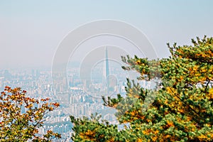 Lotte World Tower and Seoul city view from Namhansanseong Fortress in Gwangju, Korea photo