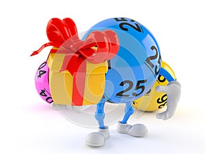 Lotto ball character holding gift photo