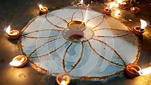 Lotus Design Art Beautiful Rangoli And Burning Diya Lamps. Unique Peaceful.