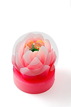 Lotus flower candle. Isolated, with clipping path