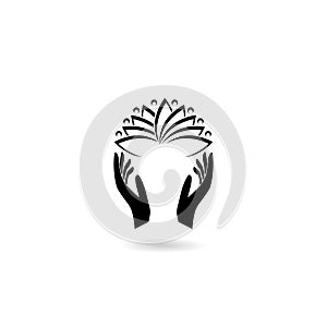 Lotus flower in hands icon with shadow