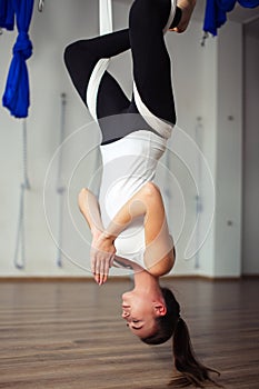 Lotus pose in aero anti gravity yoga. Aerial exercises