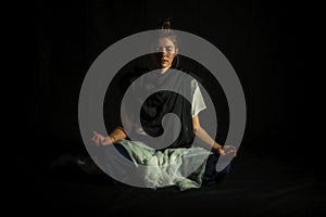 Lotus Pose on a black background