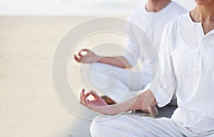 Lotus pose, couple and meditation on beach for zen and wellness with holistic healing outdoor for calm and yoga. Ocean