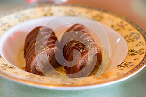 Lotus root appetizer stuffed with sticky rice in sugar syrup with osmanthus blossoms Shanghai appetiser photo