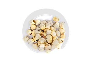Lotus seed pile isolated over white background top down view