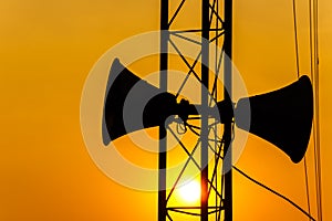 Loudspeaker on pillar and sunset in the evening
