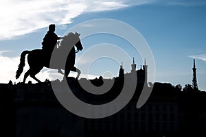 Louis XIV horse walking on Fourviere cathedral in Lyon, France photo