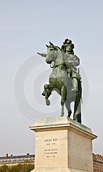 Louis XIV statue at Versailles palace photo