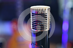 `The Lounge Act` vintage 1952 Condenser Microphone in the recording studio close up