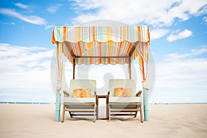 lounge chair under a cabana at the beach