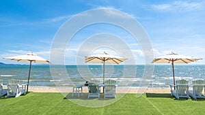 Lounge chairs with sun umbrella on a beach