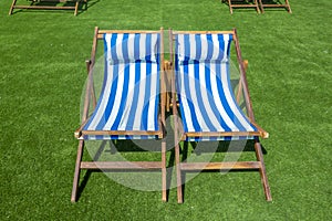 Lounge chairs with sun umbrella on a beach