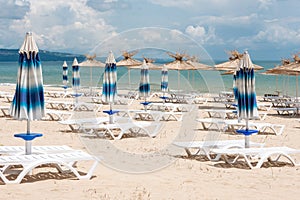 Lounge chairs and umbrellas on the beach