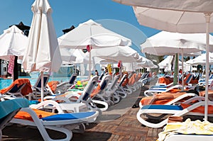 Lounges from the sun on a beach