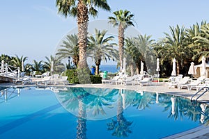 Lounges and umbrellas near the pool