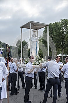Lourdes, France June 24, 2019: Preparation for going out to the evening rosary procession at the Marian shrine in Lourdes