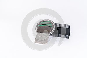 Louse comb for lice treatment, metal and plastic.