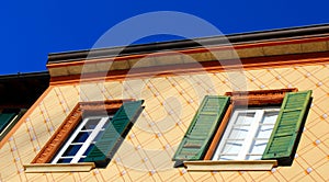 Louver windows and painted texture wall