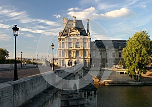 Louvre at the bridge over the river Seine