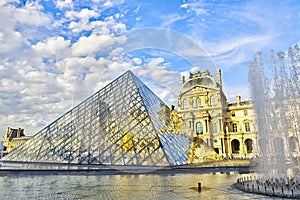 Louvre facade with glass triangle france big art museum