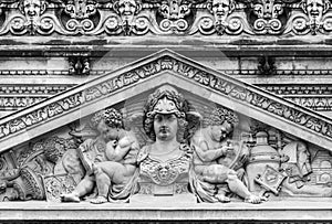 Louvre facade statue