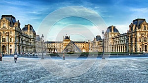 Louvre Museum and glass piramid in Paris