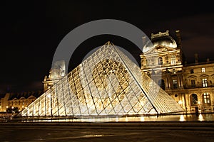 Louvre museum in Paris at night