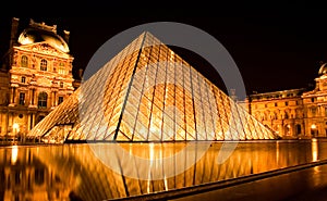 Louvre pyramid by night