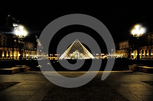 Louvre pyramid by night, Paris, France.