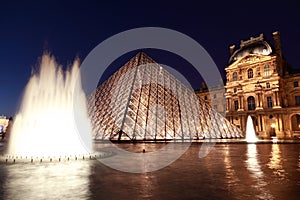 Louvre Pyramid and Pavillon Rishelieu in evening
