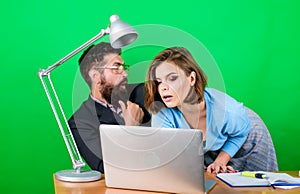 Love affair at work. Seduction. business couple at computer. businessman and assistant solve problem. woman and man work